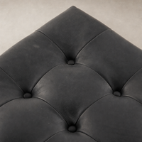 Hudson Cocktail Ottoman in Heirloom Black with tufted texture and luxurious finish.