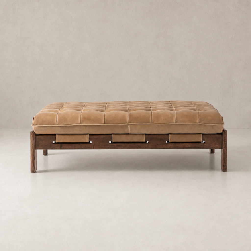 Hudson Cocktail Ottoman in Palermo Drift with tufted cushion and wooden base.