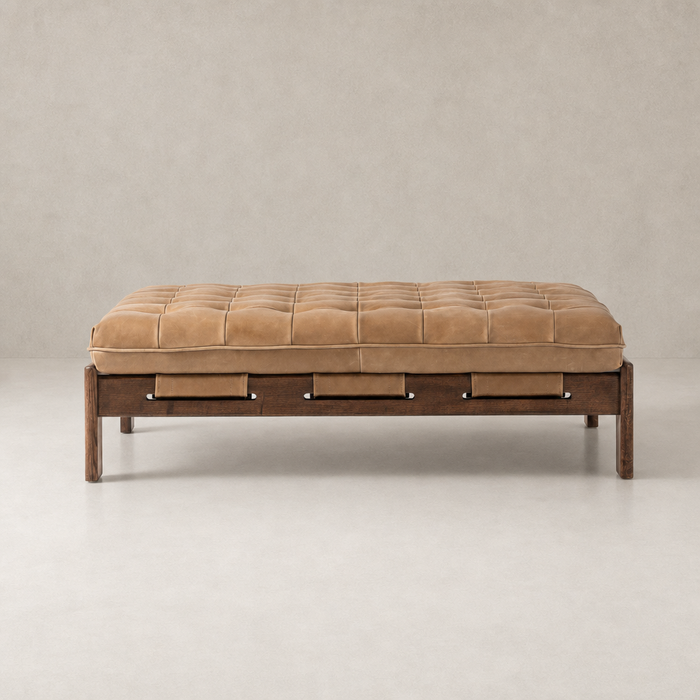 Hudson Cocktail Ottoman in Palermo Drift with tufted cushion and wooden base.