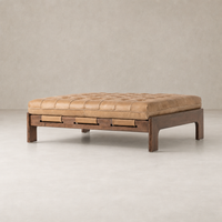 Hudson Cocktail Ottoman in Palermo Drift with tufted leather and wooden base.
