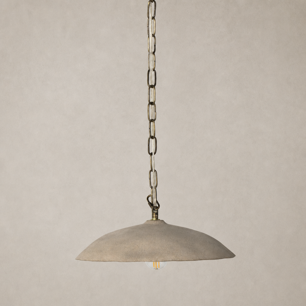 Light sand porcelain ceramic pendant light with an elegant, curved design.