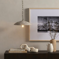 Light sand porcelain ceramic pendant with a sleek, curved design and chain hanging.