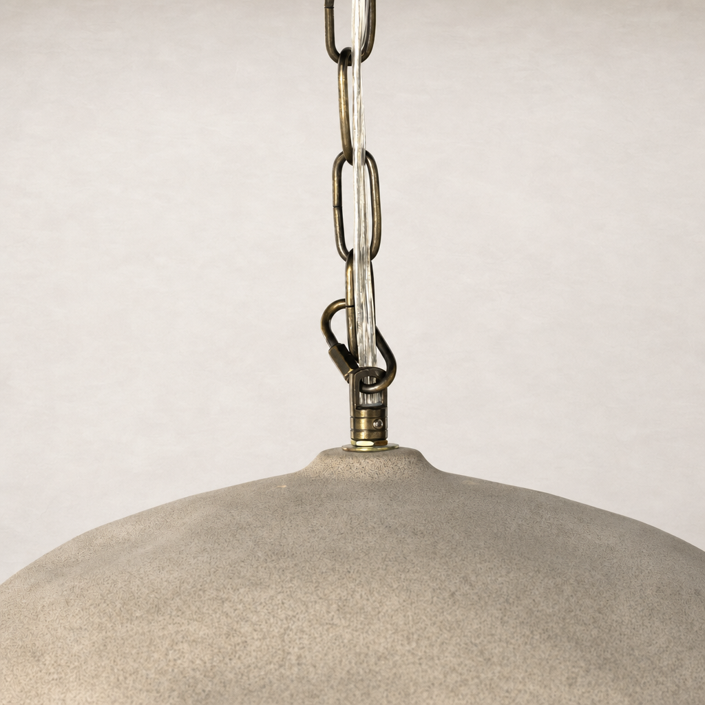 Light sand porcelain ceramic pendant with a sleek rounded shape and metal chain.