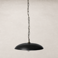 Aged black terracotta ceramic pendant with a sleek dome shape and chain link.