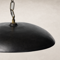 Aged black terracotta ceramic pendant with a smooth, dome-shaped design.