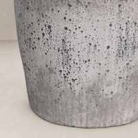 Antique white ceramic table lamp featuring a textured speckled finish.