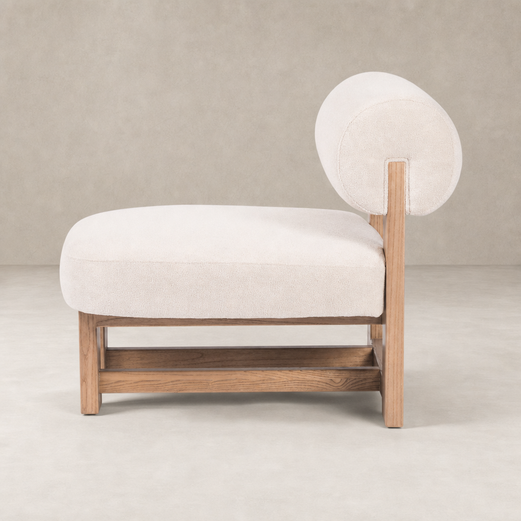 Isla Chair in Piermont Oyster, featuring a rounded back and sleek wooden base.