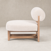 Isla Chair in Piermont Oyster, featuring a rounded back and sleek wooden base.