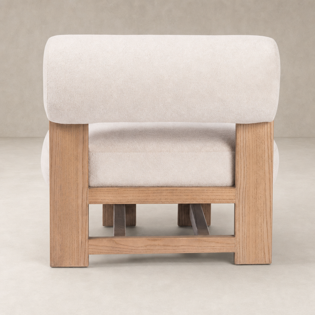 Isla Chair in Piermont Oyster featuring a rounded back and natural wood frame.