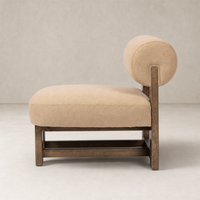 Isla Chair in Piermont Sand featuring a plush seat and rounded backrest.
