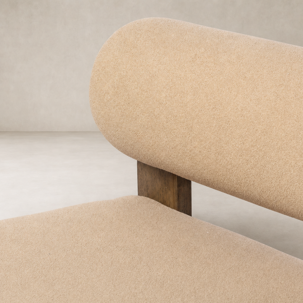 Isla Chair in Piermont Sand featuring soft, textured upholstery and a subtle round silhouette.