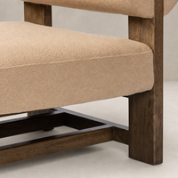 Isla Chair in Piermont Sand featuring a textured fabric upholstery and sturdy wooden frame.