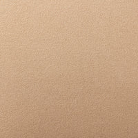Close-up of Isla Chair fabric in Piermont Sand, featuring soft, textured upholstery.