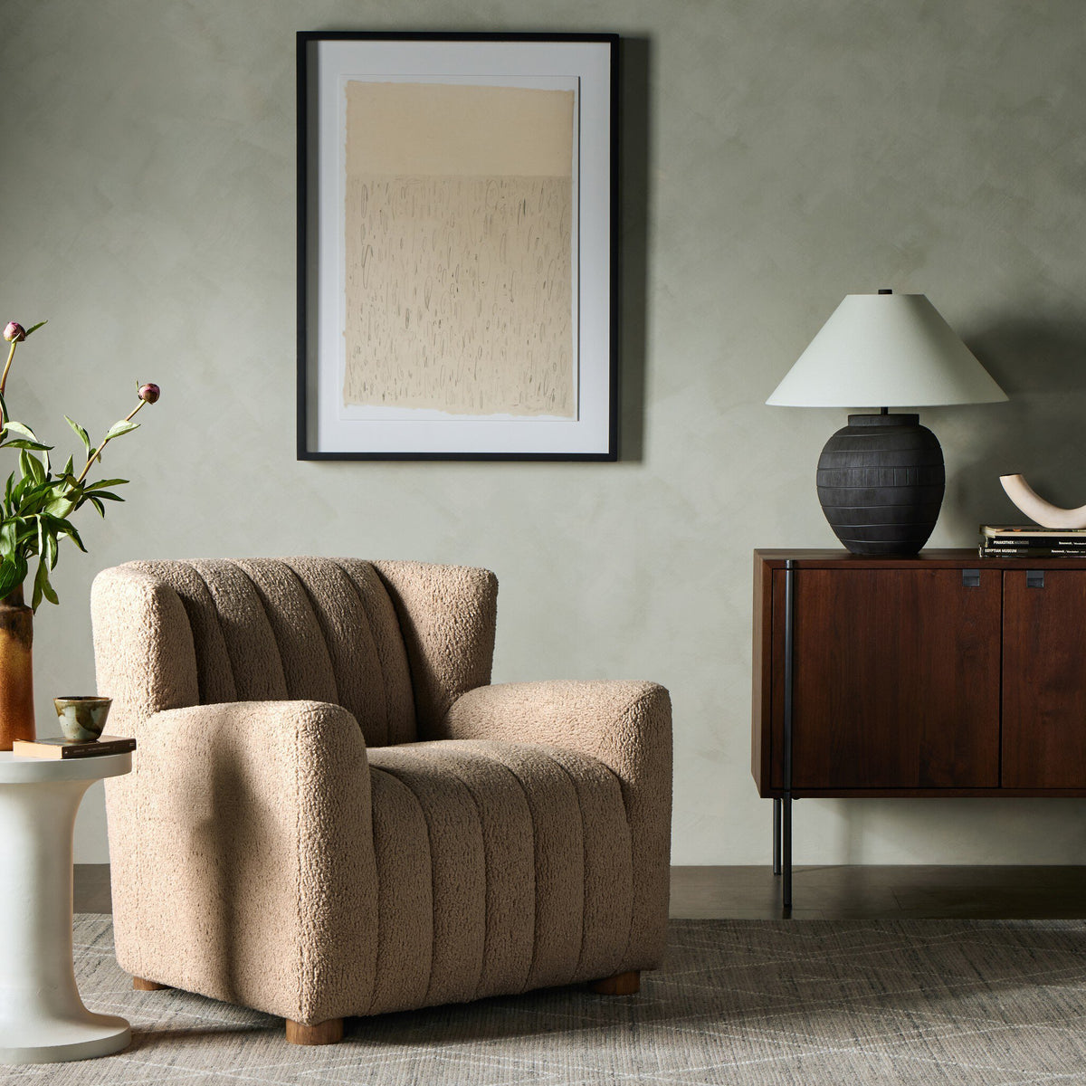 Baldwin Chair in Sheepskin Camel showcasing plush texture and modern curved design.