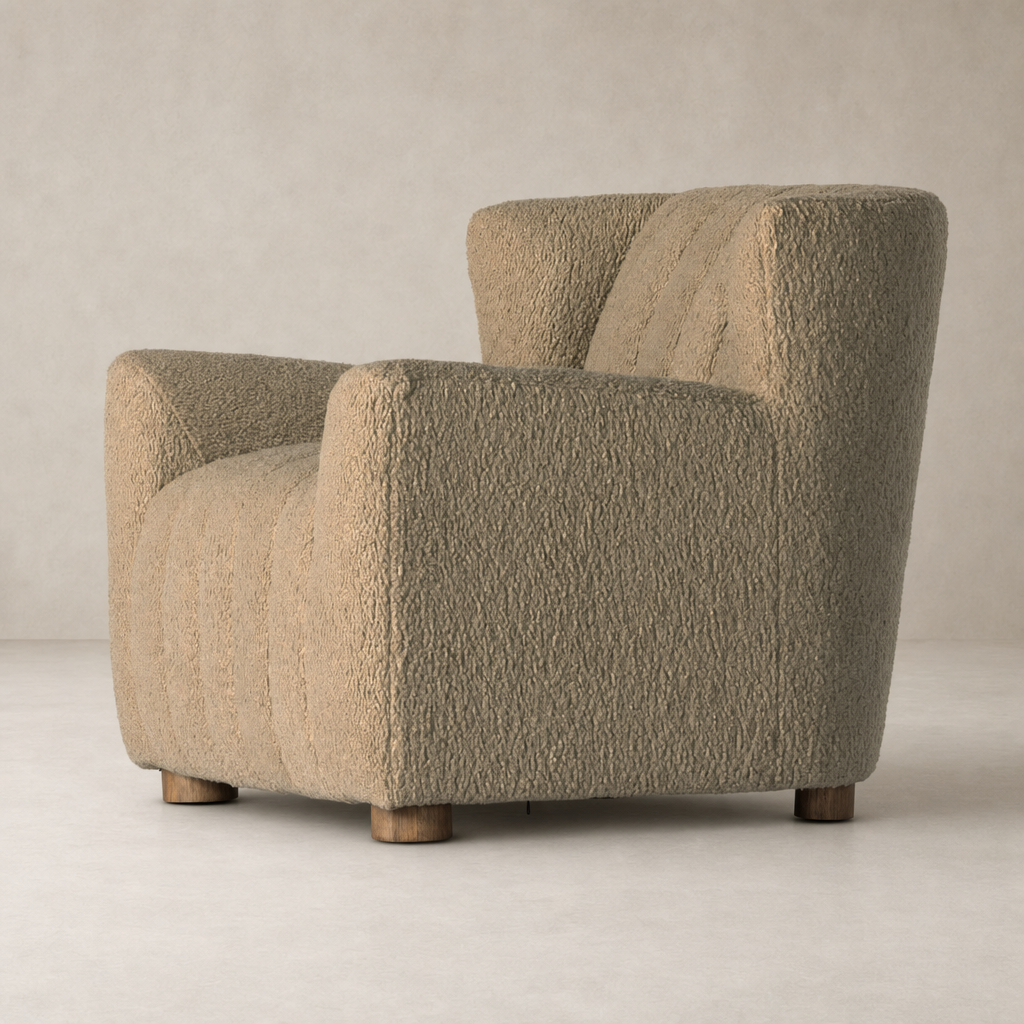 Baldwin Chair in Sheepskin Camel featuring a textured finish and sturdy wooden legs.