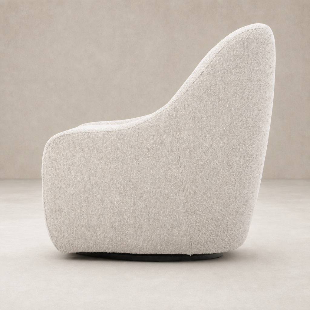 Rose Swivel Chair in Knoll Sand featuring a rounded, cozy shape and textured upholstery.