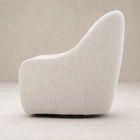Rose Swivel Chair in Knoll Sand featuring a rounded, cozy shape and textured upholstery.
