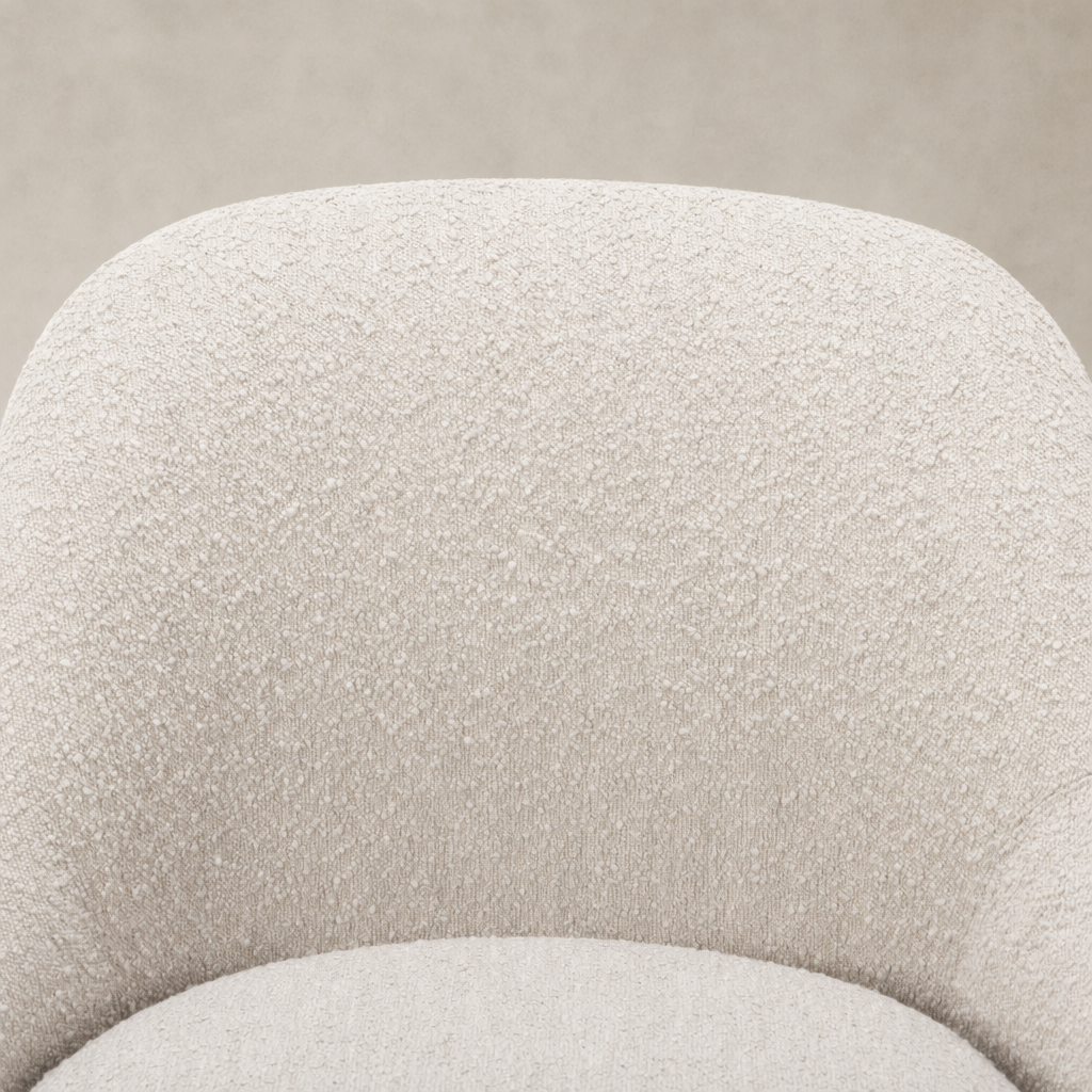 Close-up of the textured Knoll Sand fabric on Rose Swivel Chair.
