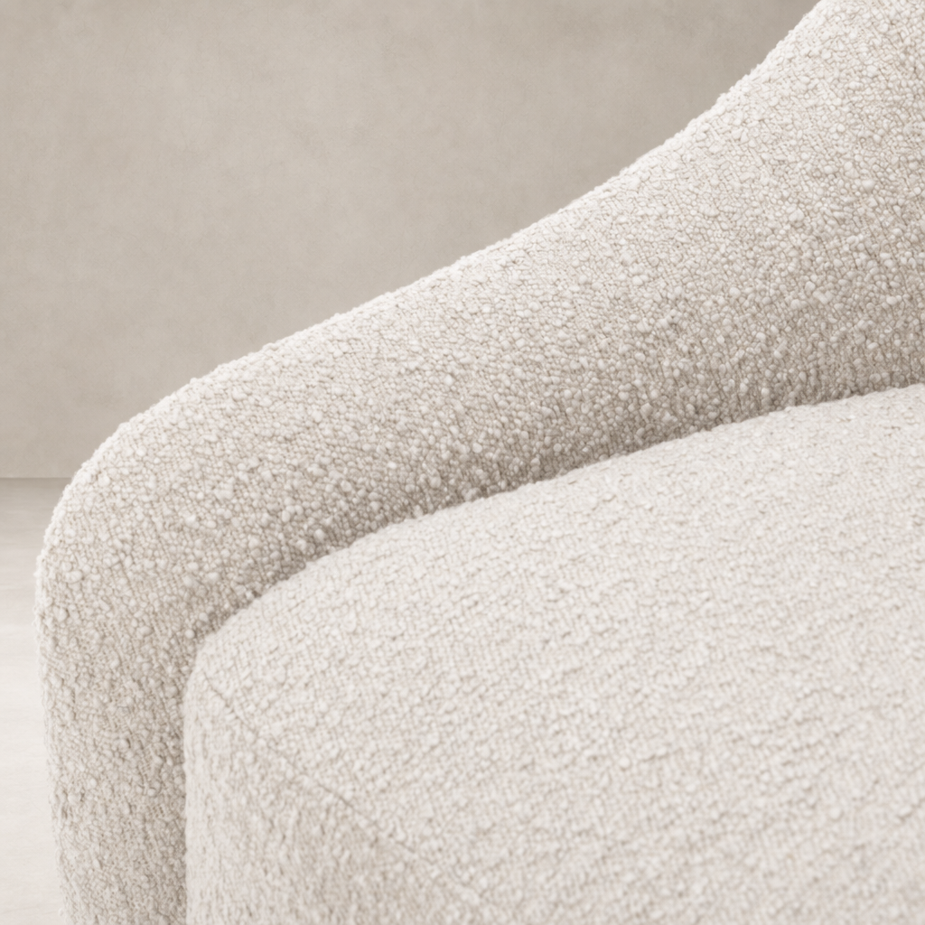 Close-up of the cozy Knoll Sand fabric on the Rose Swivel Chair.