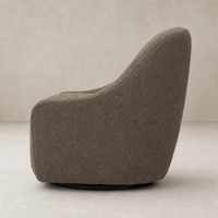 Rose Swivel Chair in Knoll Clay features a soft, textured fabric and curved silhouette.