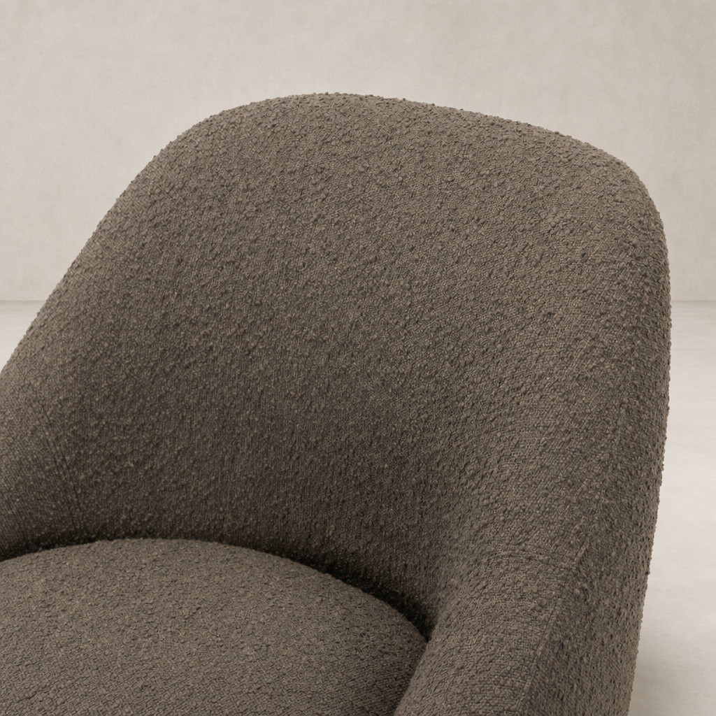 Close-up of the textured Knoll Clay fabric on the Rose Swivel Chair.