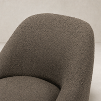 Close-up of the textured Knoll Clay fabric on the Rose Swivel Chair.