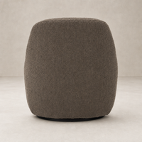 Rose Swivel Chair in Knoll Clay featuring a round, textured fabric design.