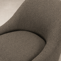 Textured Knoll Clay upholstery of the Rose Swivel Chair, showcasing its modern design.
