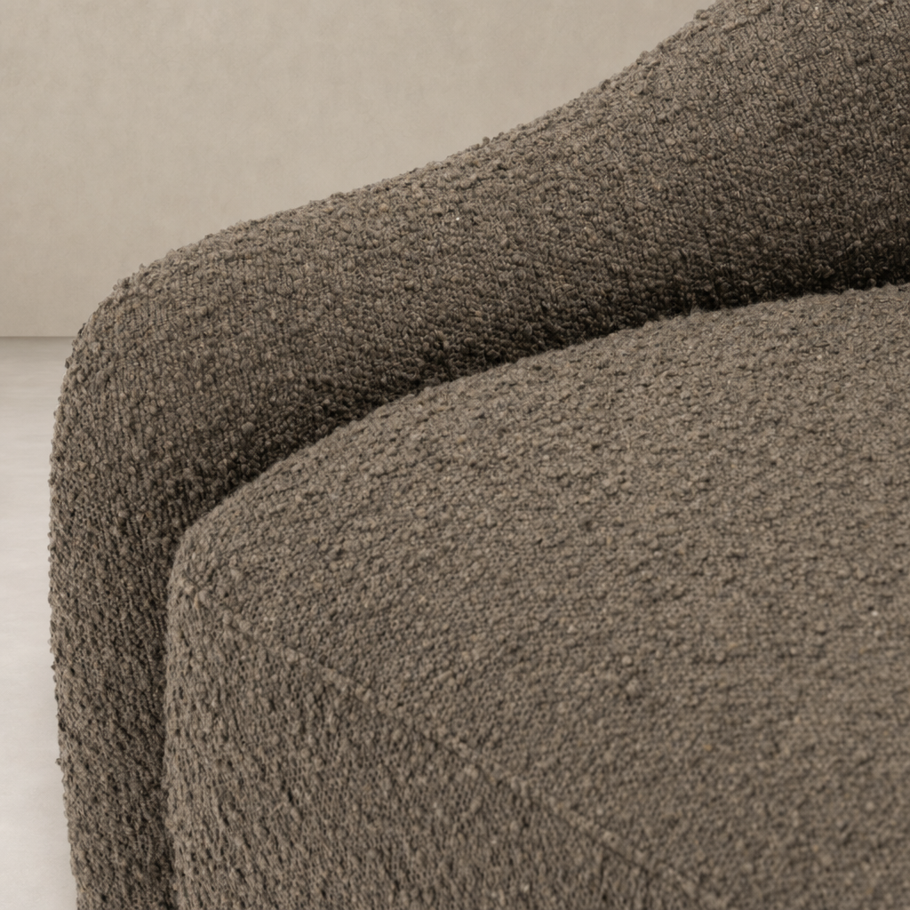 Textured close-up of the Rose Swivel Chair in Knoll Clay fabric.