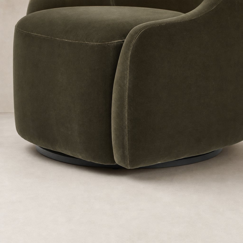 Rose Swivel Chair in Surrey Olive with plush, rounded upholstery and sleek base.