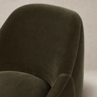 Rose Swivel Chair in Surrey Olive highlighting plush upholstery and smooth curves.