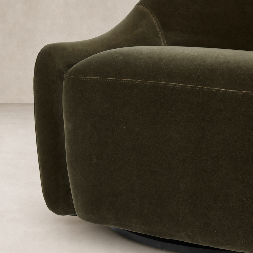 Rose Swivel Chair in Surrey Olive with soft, curved upholstery and sleek swivel base.