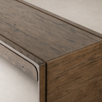 Rustic grey Zinnia Desk featuring a smooth surface and rounded edges.