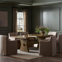 Pelton Dining Table in drifted oak, featuring a sturdy, uniquely designed base.