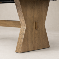 Pelton Dining Table features a stylish drifted oak base with an angular design.
