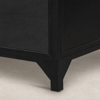 Quinn Wide Metal Cabinet featuring a sleek black finish and geometric design details.
