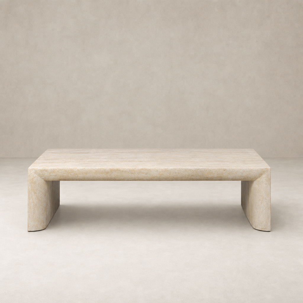 Bram Coffee Table in faux travertine with smooth, modern lines and a minimalist design.