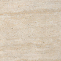 Faux travertine texture of the Bram Coffee Table showcasing its natural color variations.