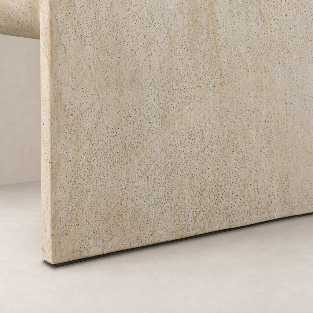 Close-up of Bram Coffee Table in faux travertine, highlighting its textured surface.