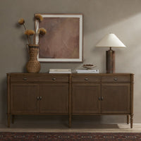 Front view of the Yara Sideboard in a warm wood finish, featuring elegant hardware and a stylish design.