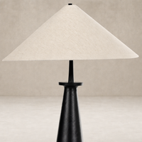 Matte black cast aluminum tapered shade floor lamp with a sleek, modern design.