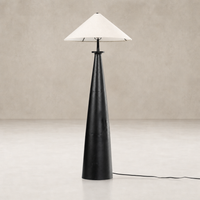 Matte black cast aluminum tapered shade floor lamp with a sleek, modern design.