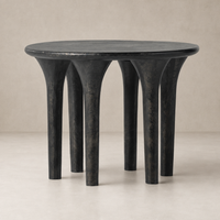 Holden End Table with distinctive rounded top and sculptural legs in a textured black finish.