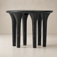 Holden End Table with unique rounded top and four sculptural legs in dark finish.