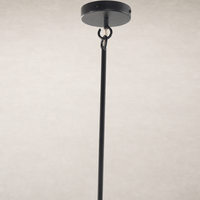 Matte white plaster pendant light with a sleek, minimalist design and hanging chain.