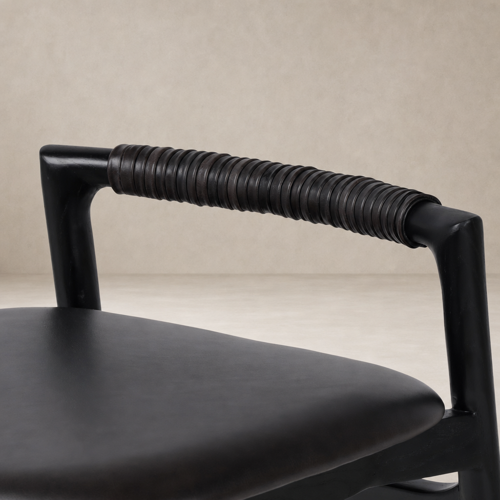 Close-up of the Nadia Bar + Counter Stool's Sonoma Black handle with ribbed texture.