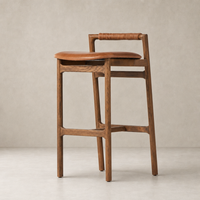 Nadia Bar + Counter Stool in Haven Tobacco with a sleek wooden frame and curved seat.