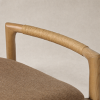 Nadia Bar + Counter Stool features a natural wood armrest with woven detail in Antwerp Cafe.