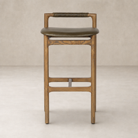 Nadia Bar + Counter Stool in Dulane Moss with a sleek wooden frame and curved seat.