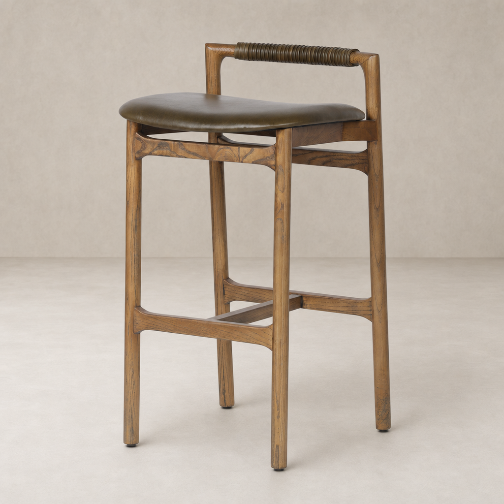 Nadia Bar + Counter Stool in Dulane Moss featuring curved seat and woven handle.